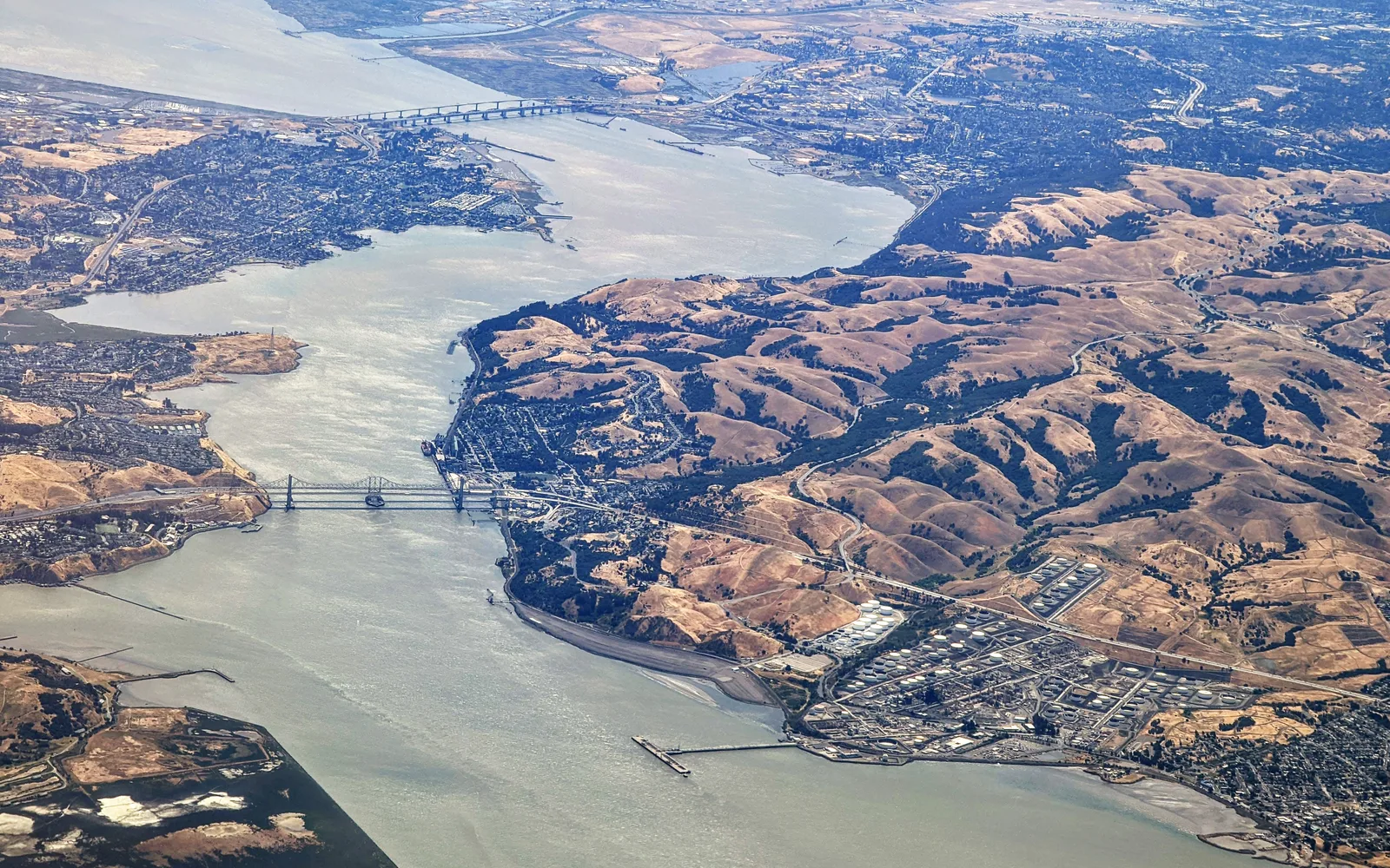 Aerial view of Carquinez Strait looking east from over San Pablo Bay, with the Carquinez Bridge in the foreground and the Benicia–Martinez Bridge in the background